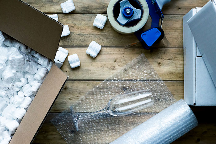 //trigmoving.com/wp-content/uploads/2018/12/packing-services-1.jpg